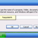 Click Run and type in info